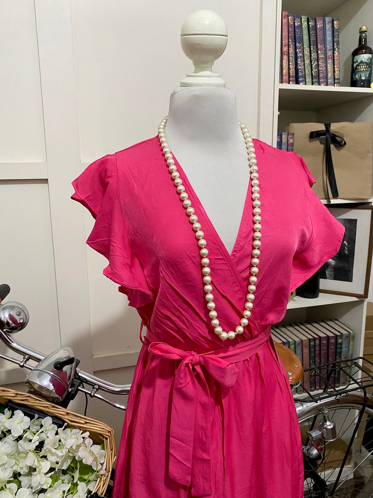 Vestido corto línea A fucsia sin manga