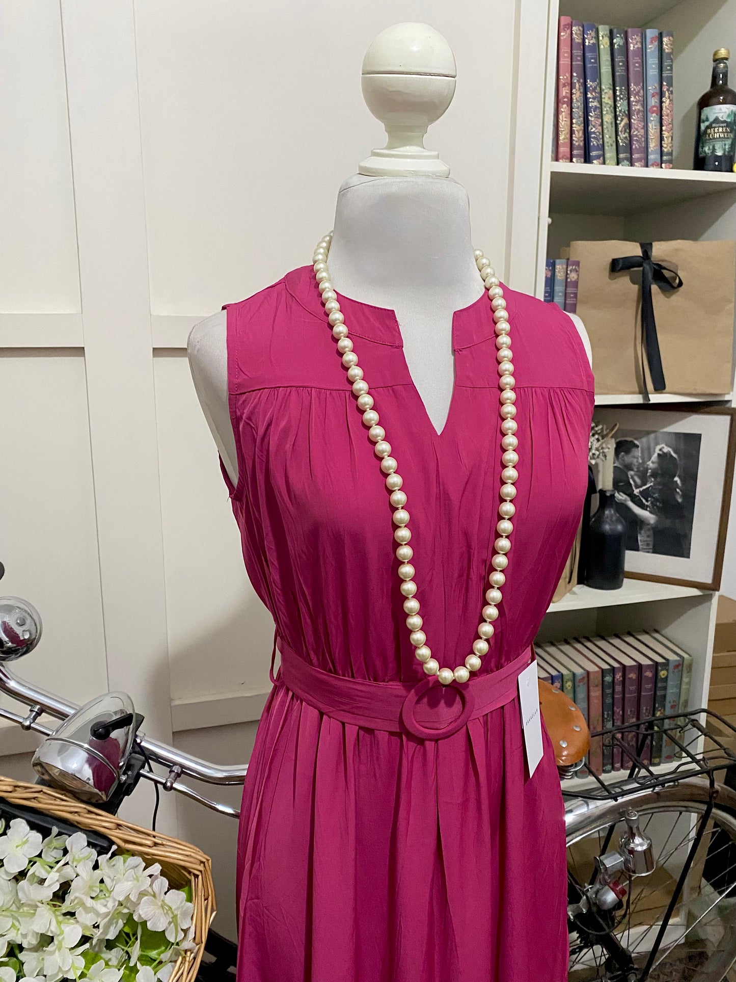 Vestido largo línea A fucsia sin manga