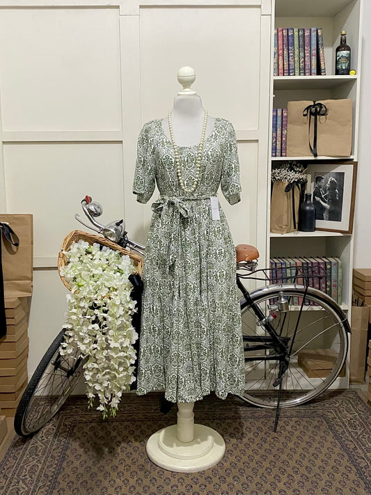 Crésida, vestido midi línea A verde estampado manga corta