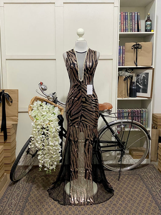 Erna, vestido largo ajustado negro estampado sin manga