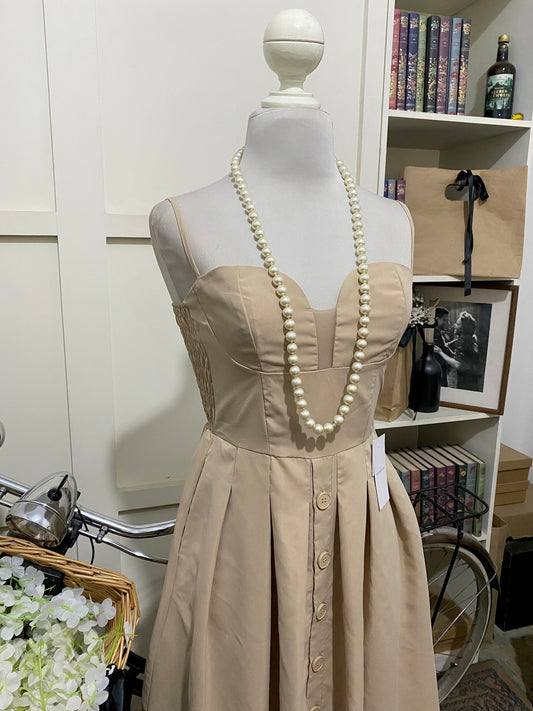 Saray, vestido midi línea A albaricoque tirantes