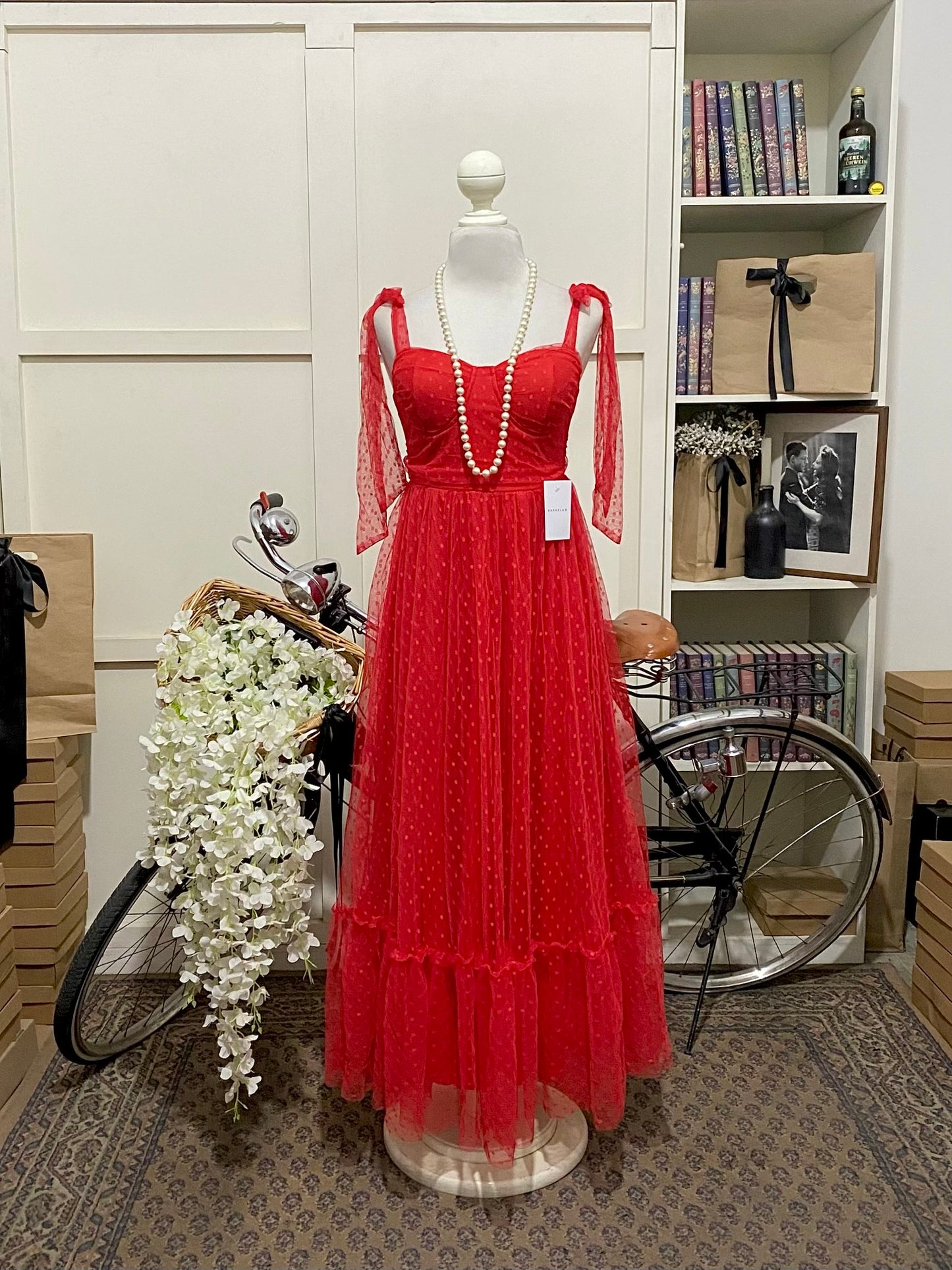 Regina, vestido midi línea A rojo tirantes