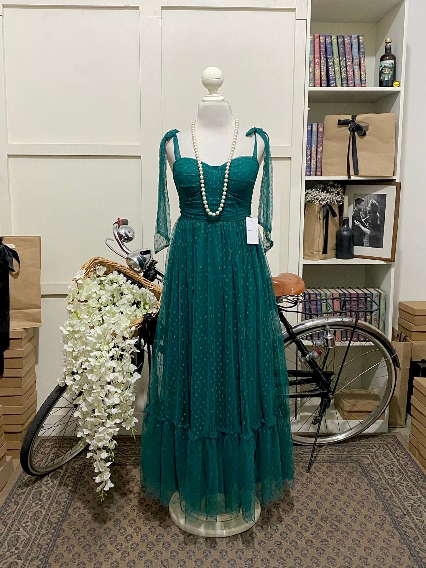 Regina, vestido midi línea A verde oscuro tirantes