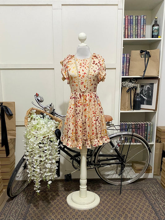 Queta, vestido corto línea A marrón claro sin manga