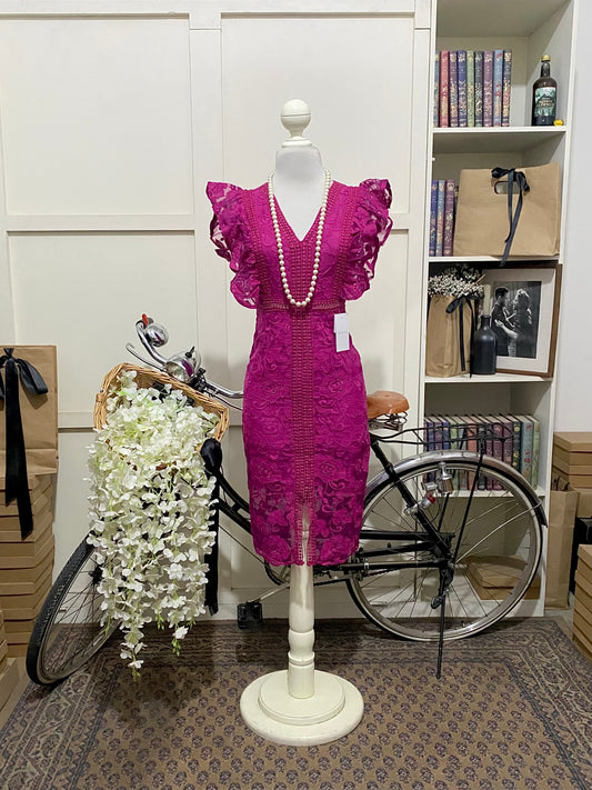 Raisa, vestido midi ajustado fucsia sin manga