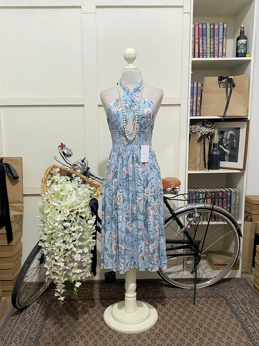 Giulia, vestido midi línea A azul flores halter