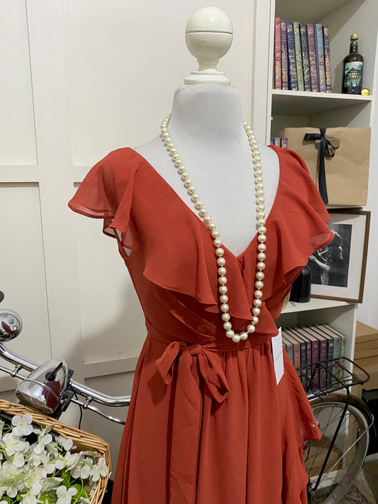 Altagracia, vestido largo línea A naranja quemada sin manga