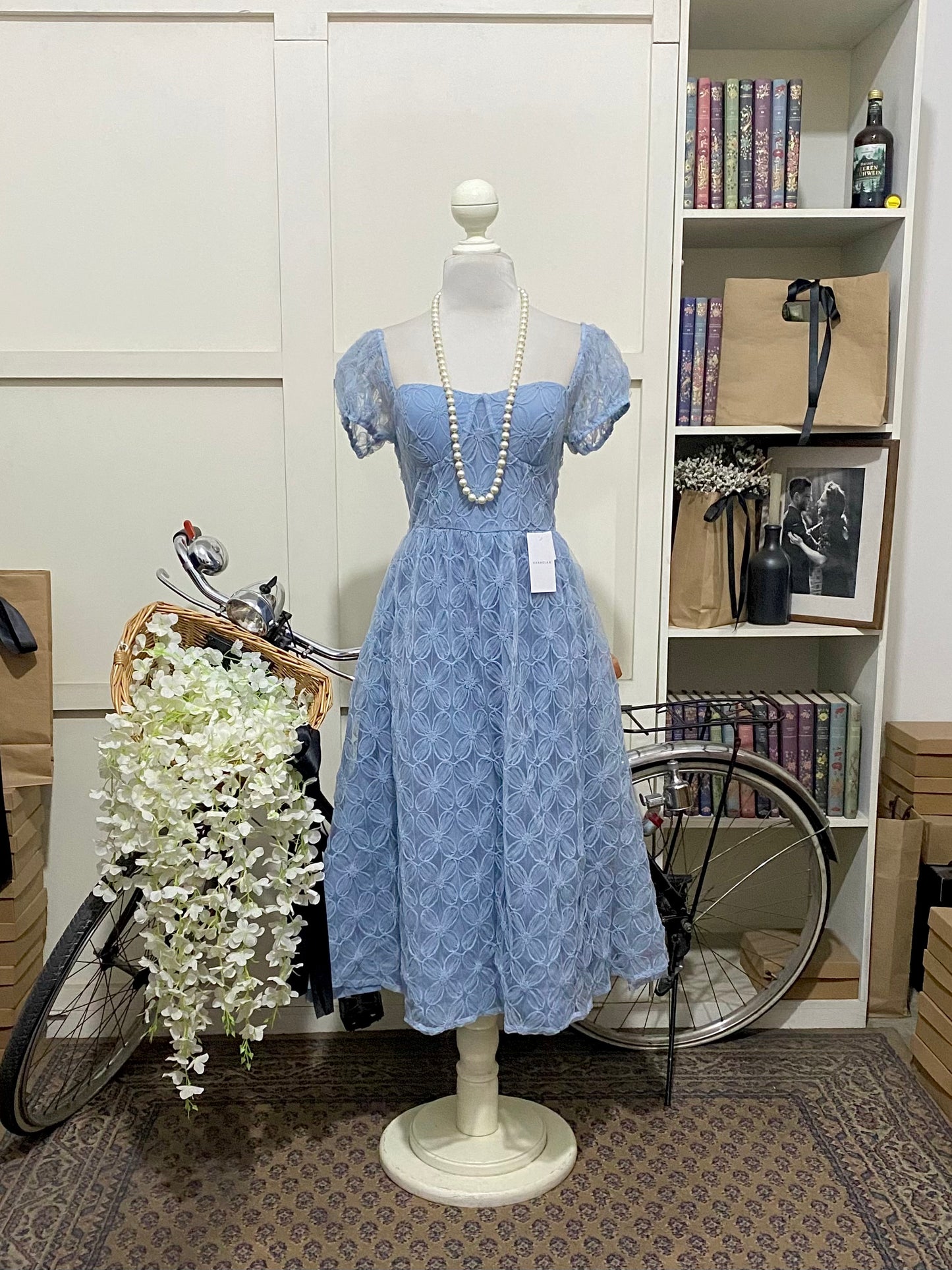 Xana, vestido midi línea A neblina azul manga corta